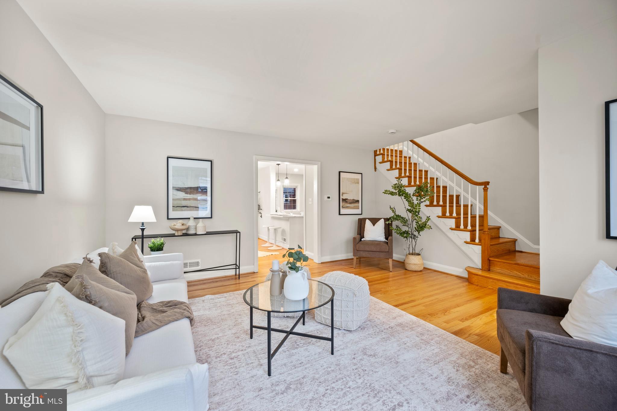 323 Stratford Road Baltimore, MD 21228 - Photo 2 of 35 a living room with furniture and a table
