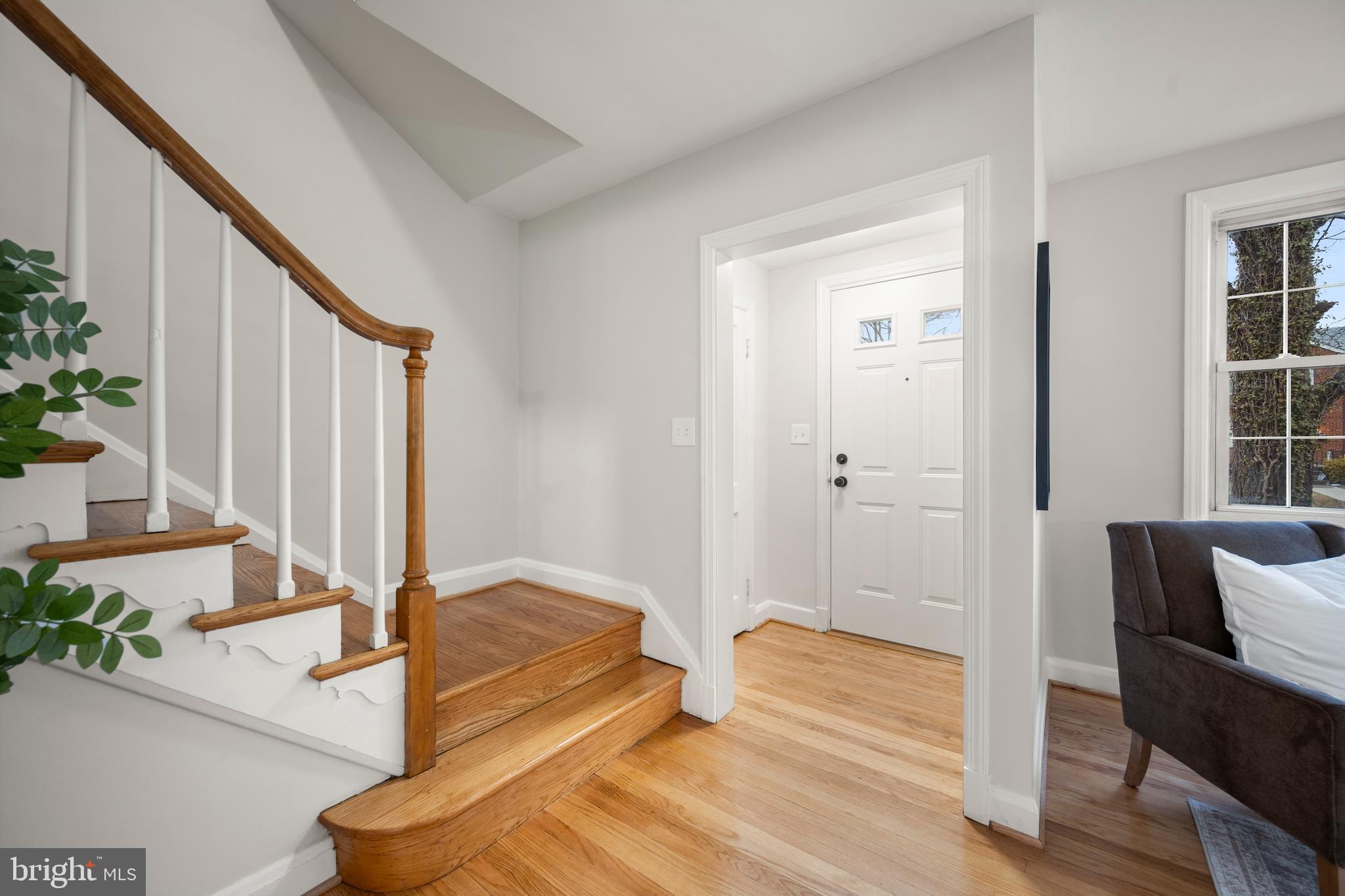 323 Stratford Road Baltimore, MD 21228 - Photo 5 of 35 a spacious bedroom with a bed and windows