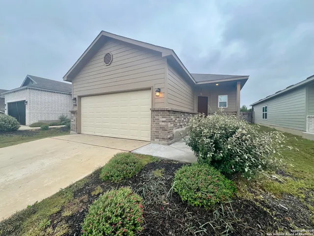 an empty room with wooden floor