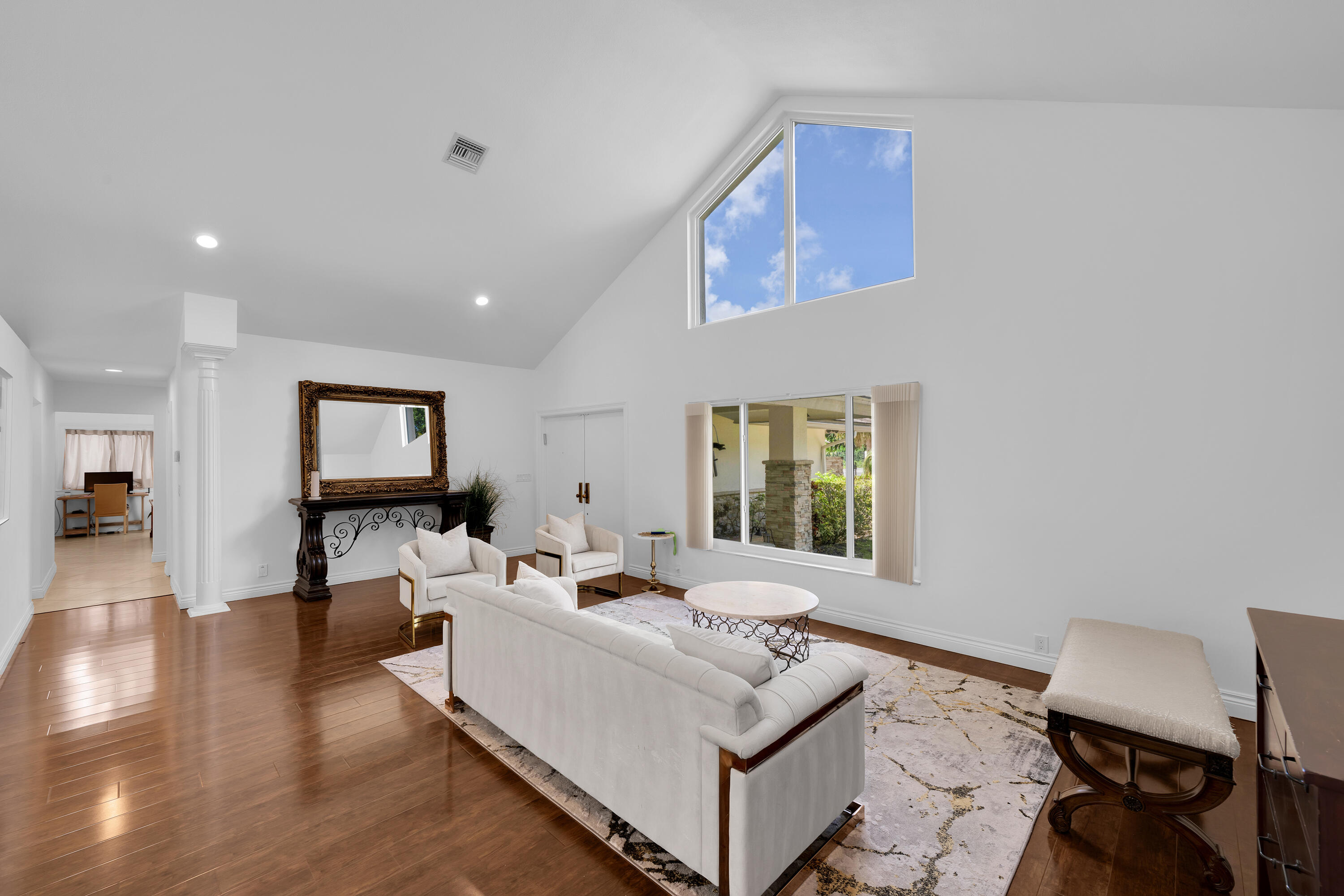 4320 St Charles Way Boca Raton, FL 33434 - Photo 4 of 34 a living room with furniture and a window