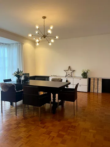 a view of a dining room with furniture