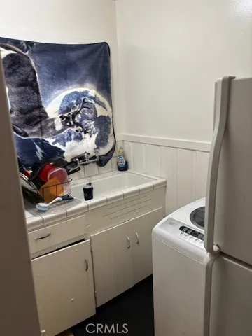 a view of a hallway with seating area