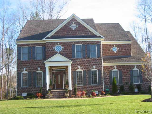 13212 Tipple Point Road Midlothian, VA 23114 - Photo 1 of 1 a front view of a house with a yard