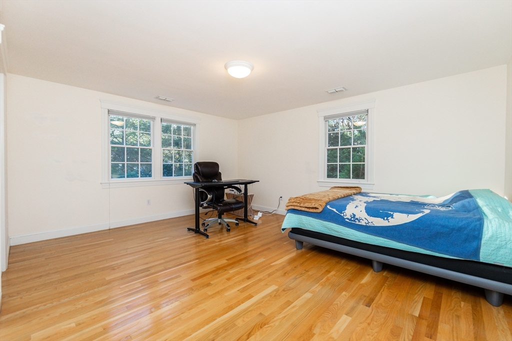 66 Suffolk Road Wellesley, MA 02481 - Photo 15 of 29 a living room with furniture and a window