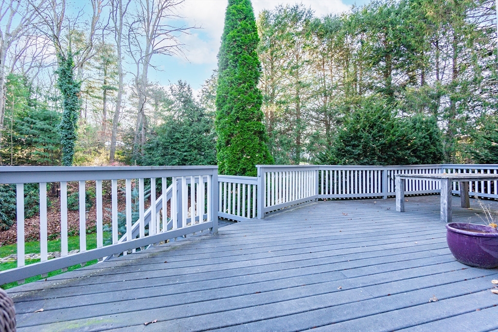 66 Suffolk Road Wellesley, MA 02481 - Photo 21 of 29 a view of deck and yard with wooden fence