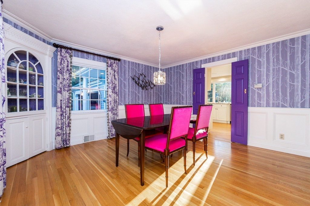 66 Suffolk Road Wellesley, MA 02481 - Photo 10 of 29 a view of a dining room with furniture and chandelier