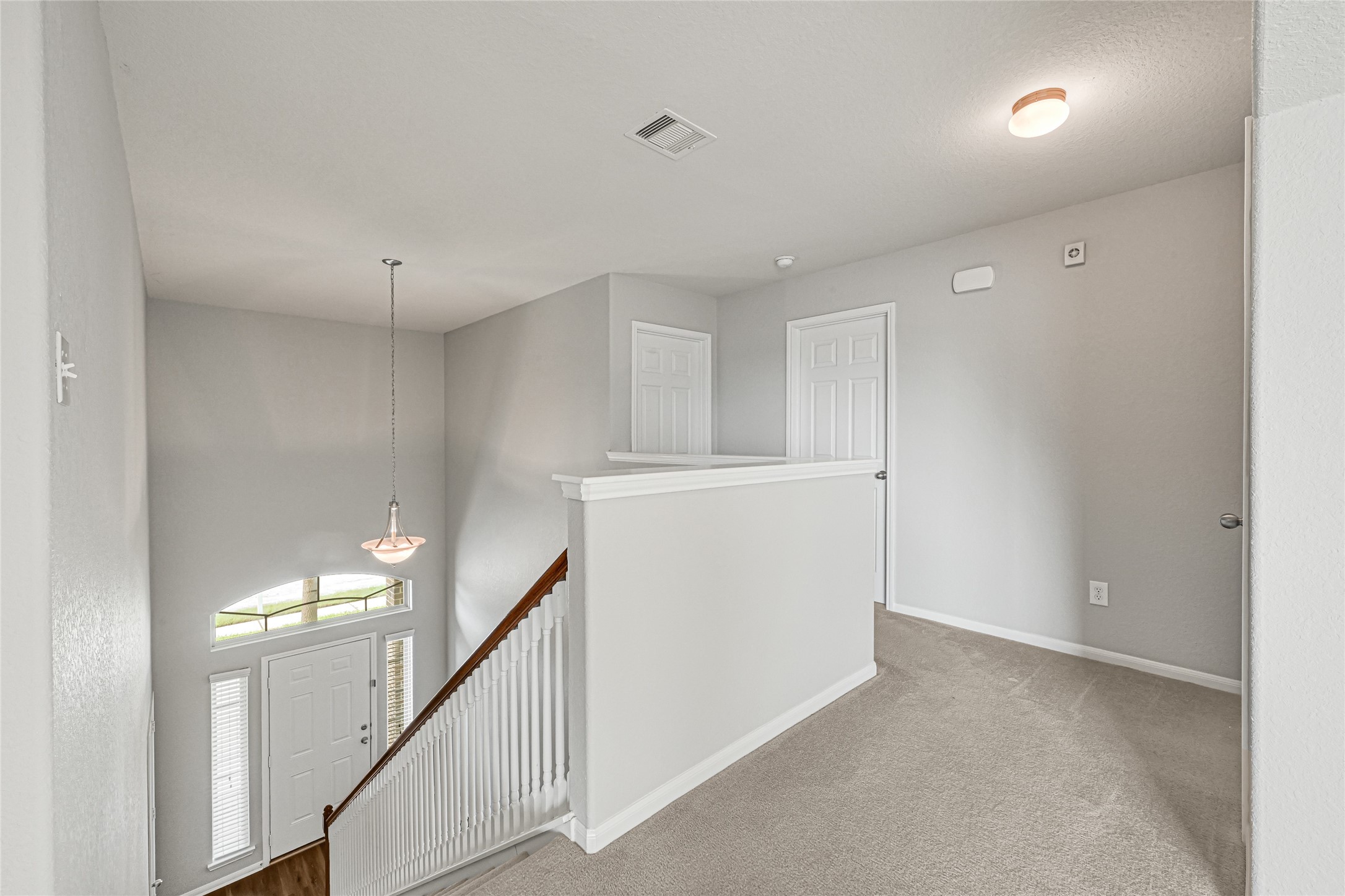 5331 Seabird Street Baytown, TX 77521 - Photo 29 of 38 a view of hallway with stairs