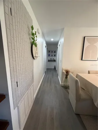 a view of livingroom with furniture and wooden floor