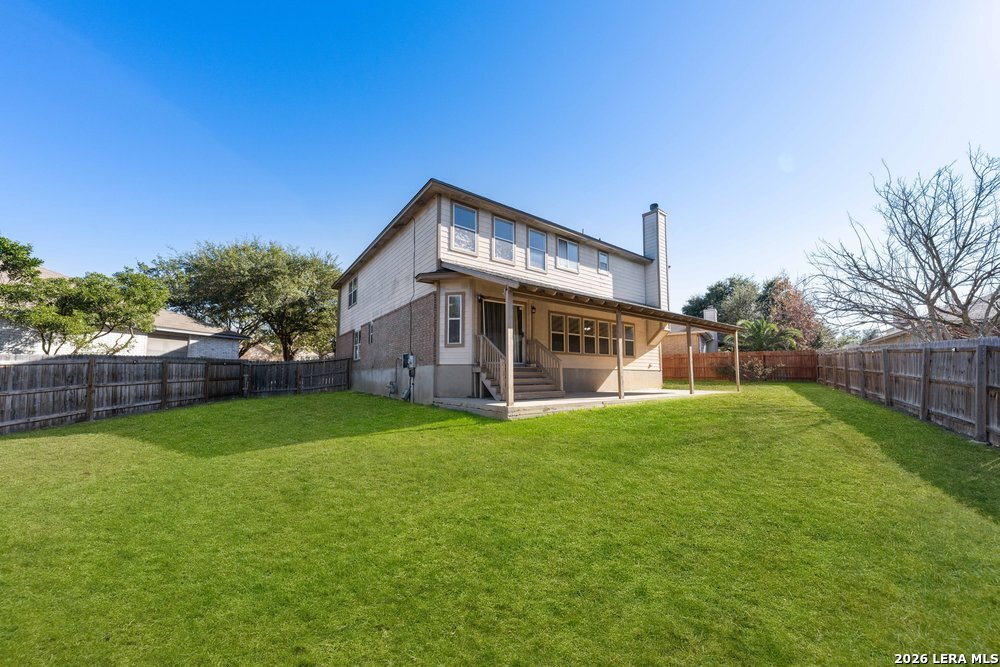 12319 Stable Rd Drive San Antonio, TX 78249 - Photo 31 of 34 a view of a house with a yard