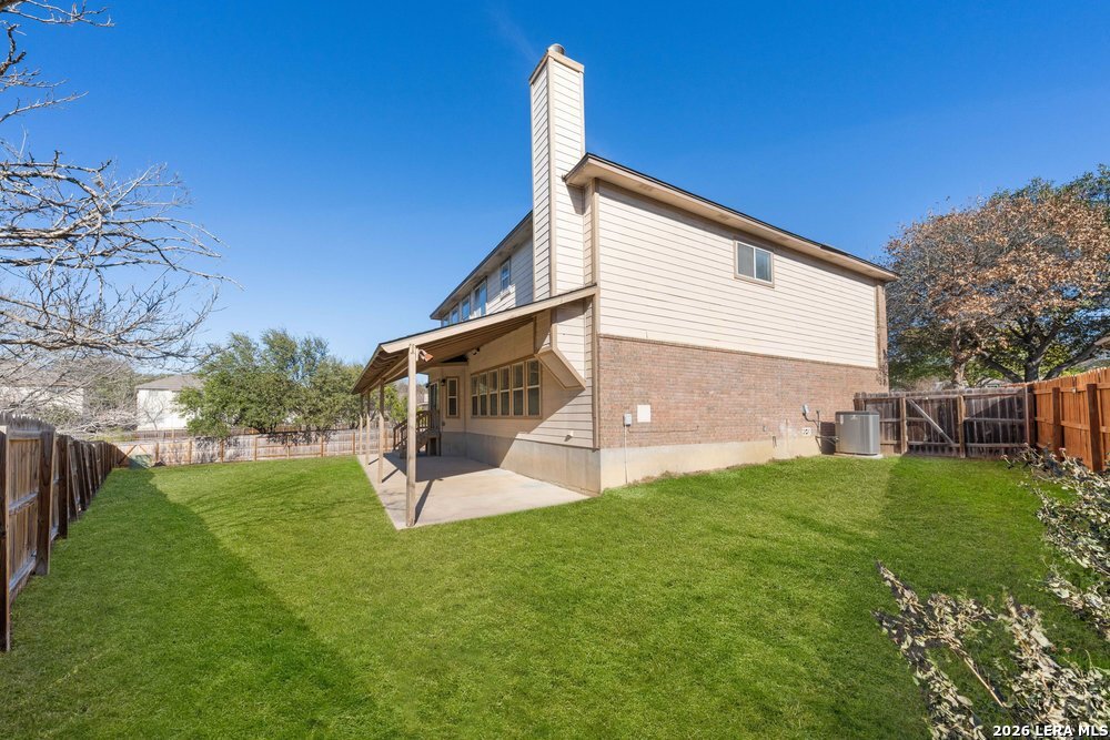 12319 Stable Rd Drive San Antonio, TX 78249 - Photo 33 of 34 a view of a house with a yard