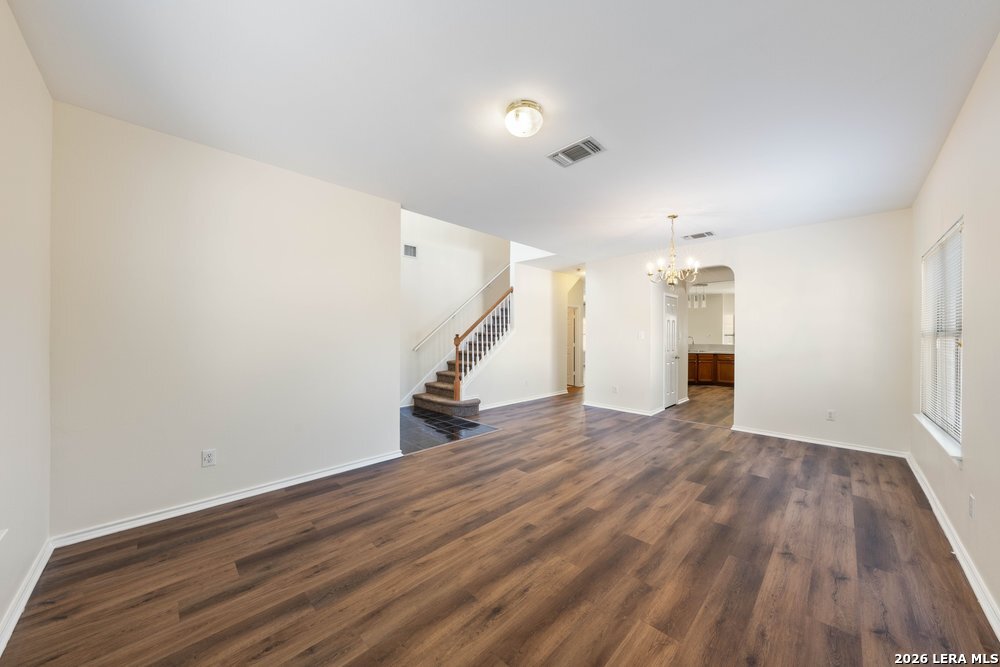 12319 Stable Rd Drive San Antonio, TX 78249 - Photo 7 of 34 a view of empty room with wooden floor