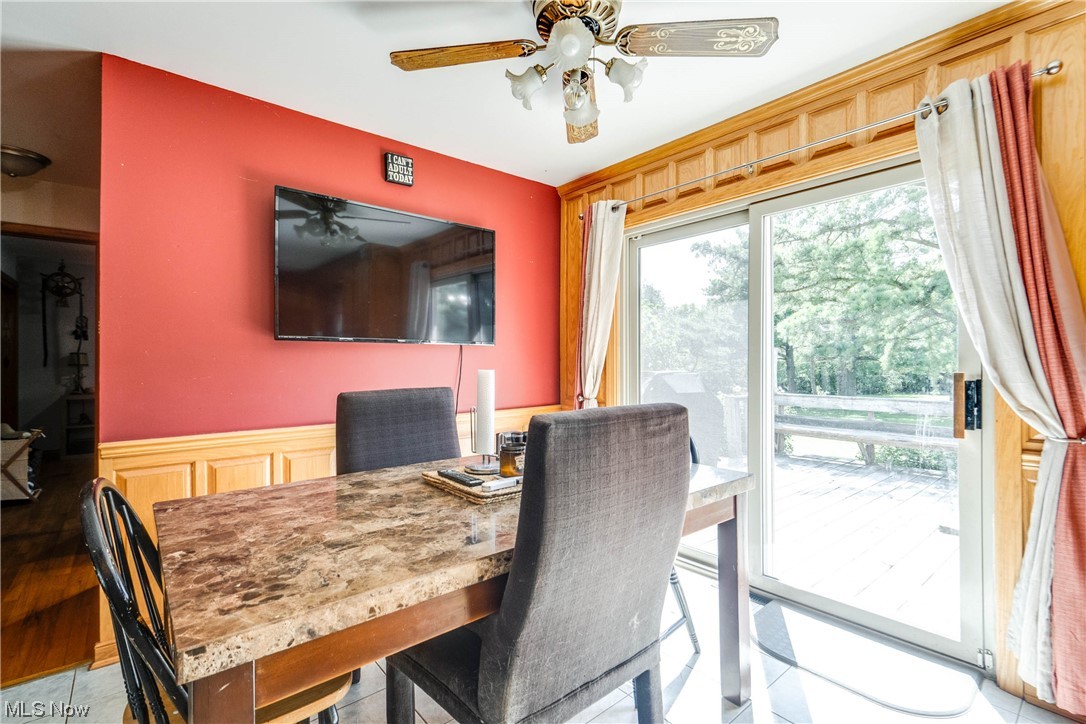 7384 Clark Road Atwater, OH 44201 - Photo 14 of 26 Tiled dining room featuring ceiling fan