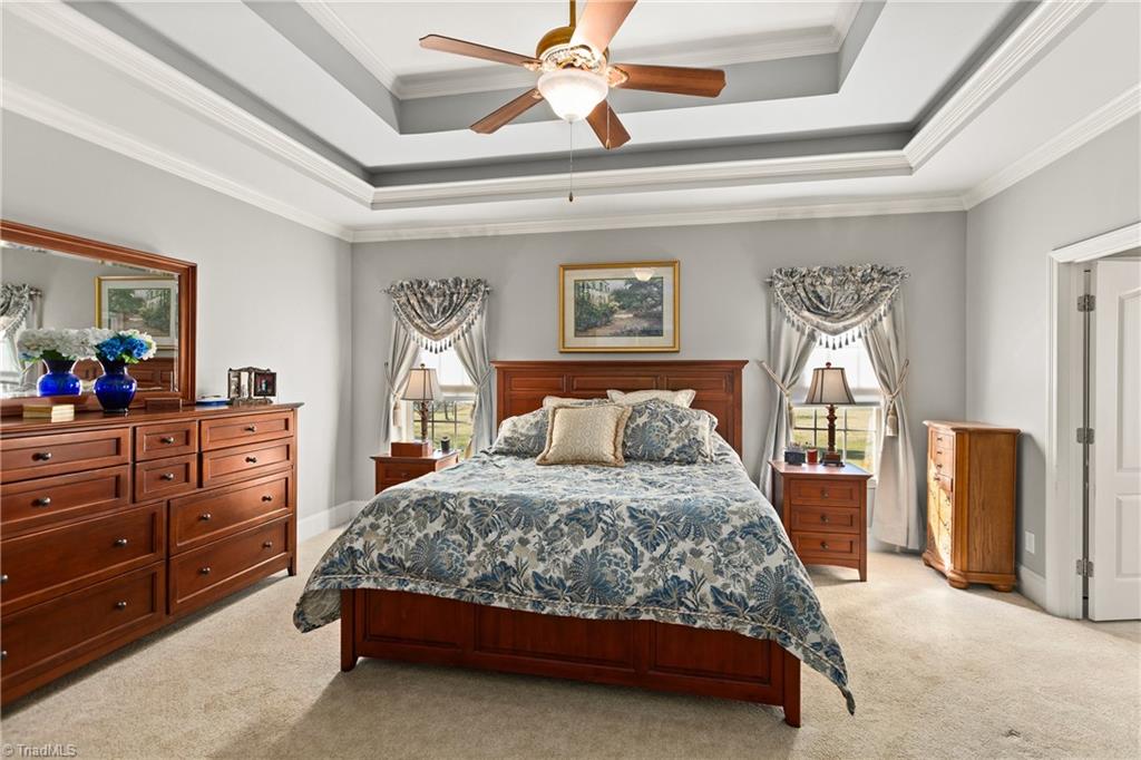 5809 Crutchfield Farm Road Oak Ridge, NC 27310 - Photo 18 of 43 Primary bedroom