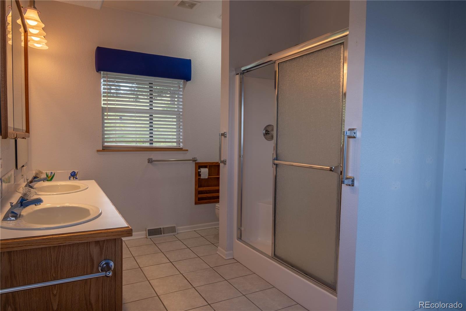 950 Junkins Loop Westcliffe, CO 81252 - Photo 20 of 35 a bathroom with a sink and a mirror