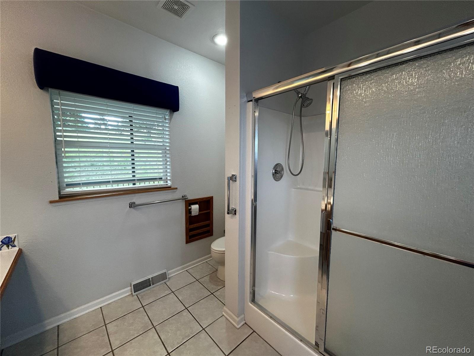 950 Junkins Loop Westcliffe, CO 81252 - Photo 31 of 35 a bathroom with a bathtub and a shower