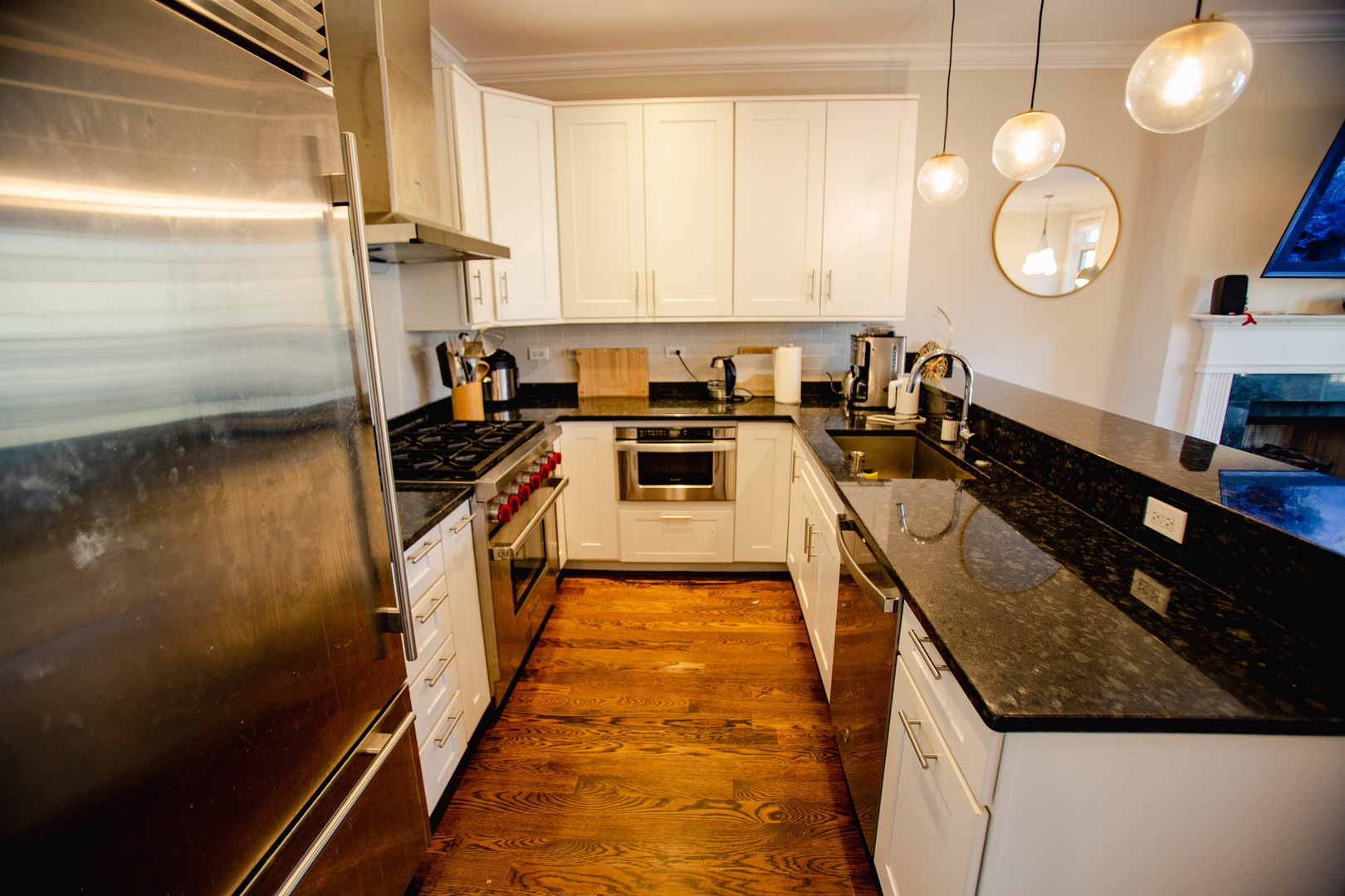 843 West Fletcher Street, Unit 2W Chicago, IL 60657 - Photo 16 of 35 a kitchen with sink and cabinets