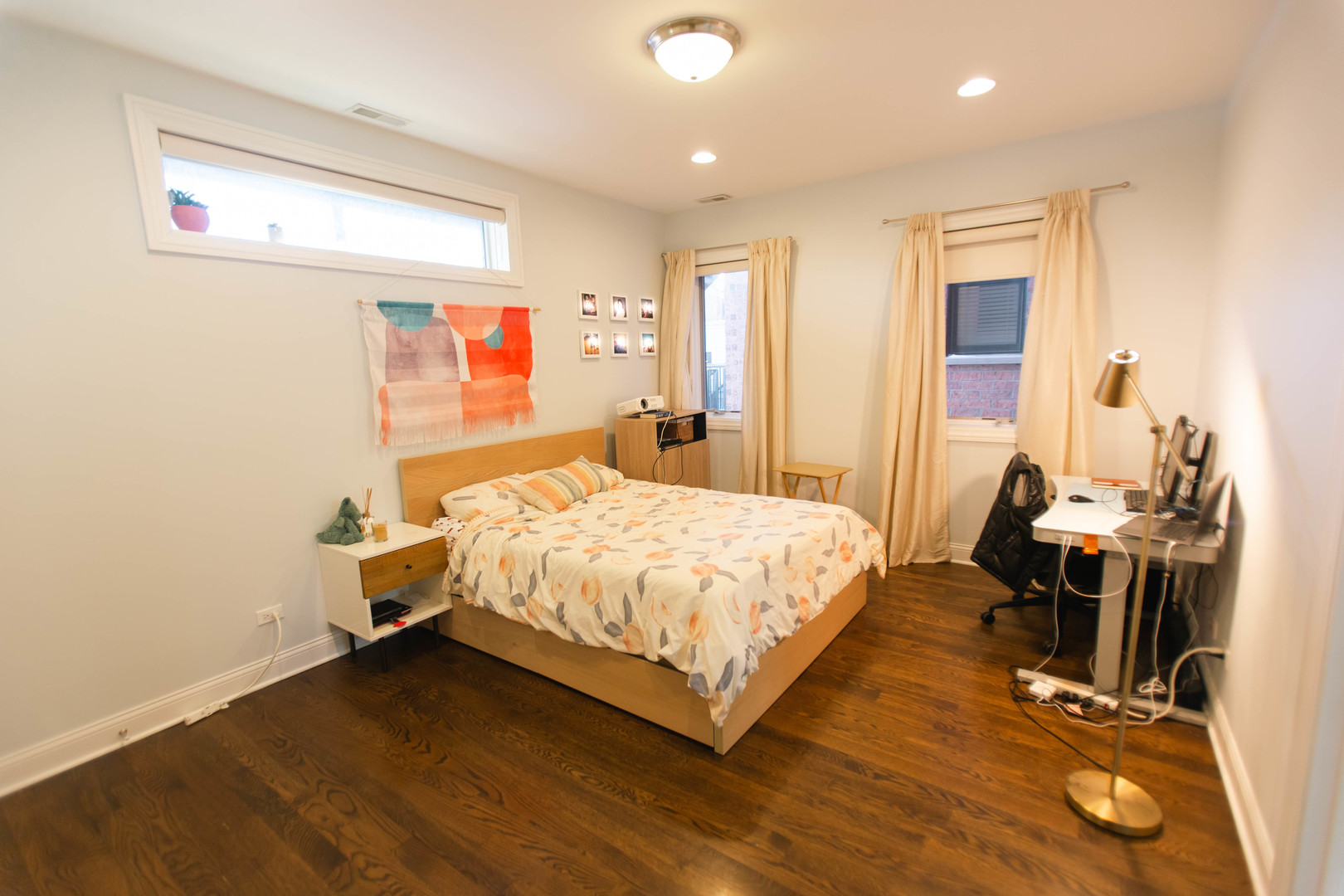 843 West Fletcher Street, Unit 2W Chicago, IL 60657 - Photo 28 of 35 a bedroom with a bed and wooden floor