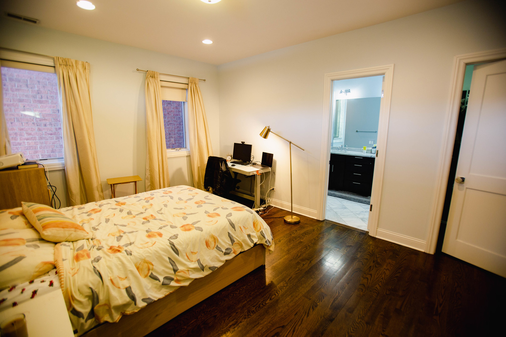 843 West Fletcher Street, Unit 2W Chicago, IL 60657 - Photo 30 of 35 a bedroom with a bed and wooden floor