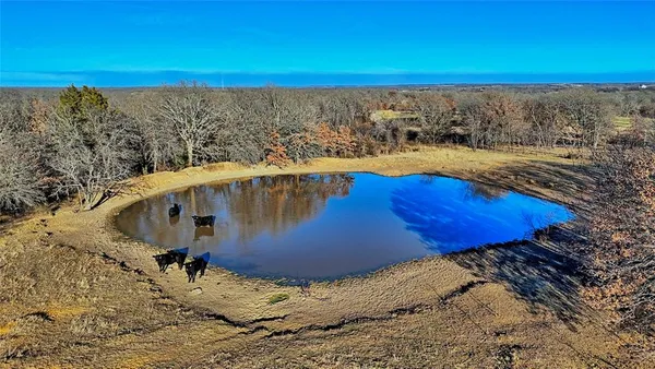 a view of a swimming pool and an ocean view