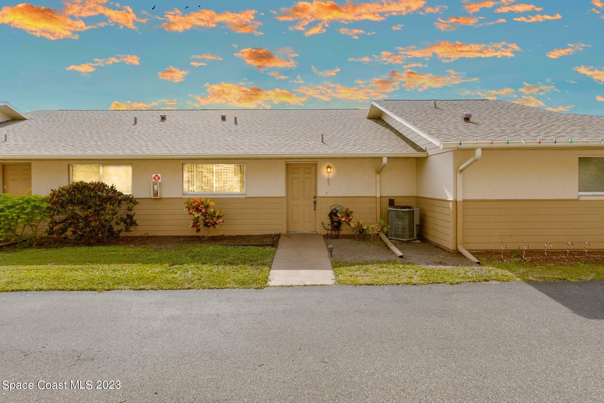 905 Prosperity Place, Unit 1902 Rockledge, FL 32955 - Photo 1 of 35 a view of an house with backyard and garage