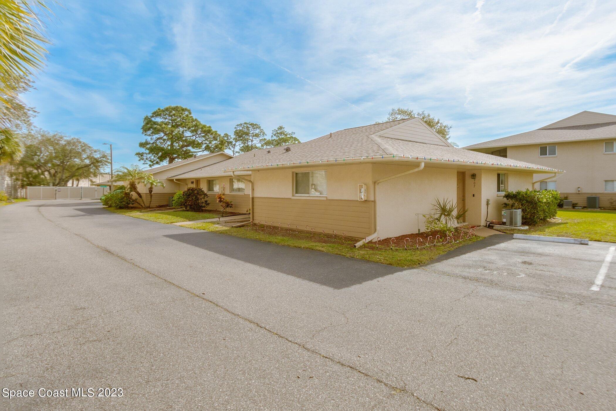 905 Prosperity Place, Unit 1902 Rockledge, FL 32955 - Photo 2 of 35 a view of a house with a street