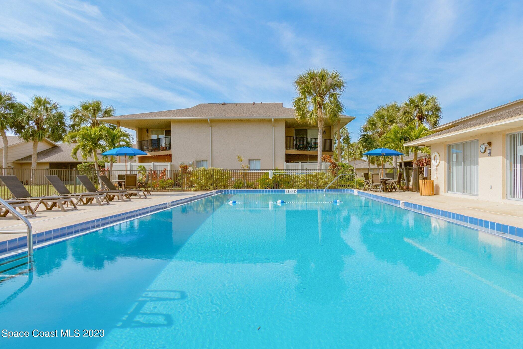 905 Prosperity Place, Unit 1902 Rockledge, FL 32955 - Photo 28 of 35 a swimming pool view with a outdoor space