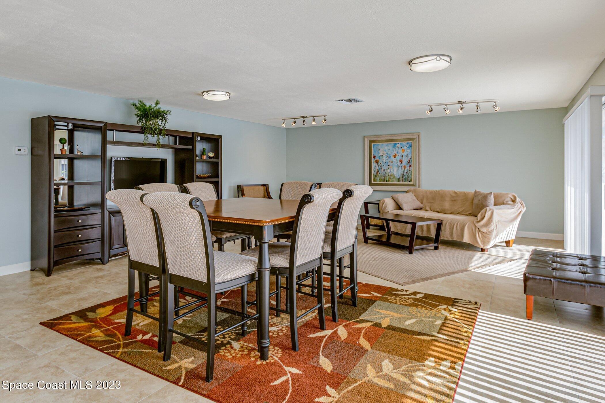 905 Prosperity Place, Unit 1902 Rockledge, FL 32955 - Photo 34 of 35 a view of a dining room with furniture