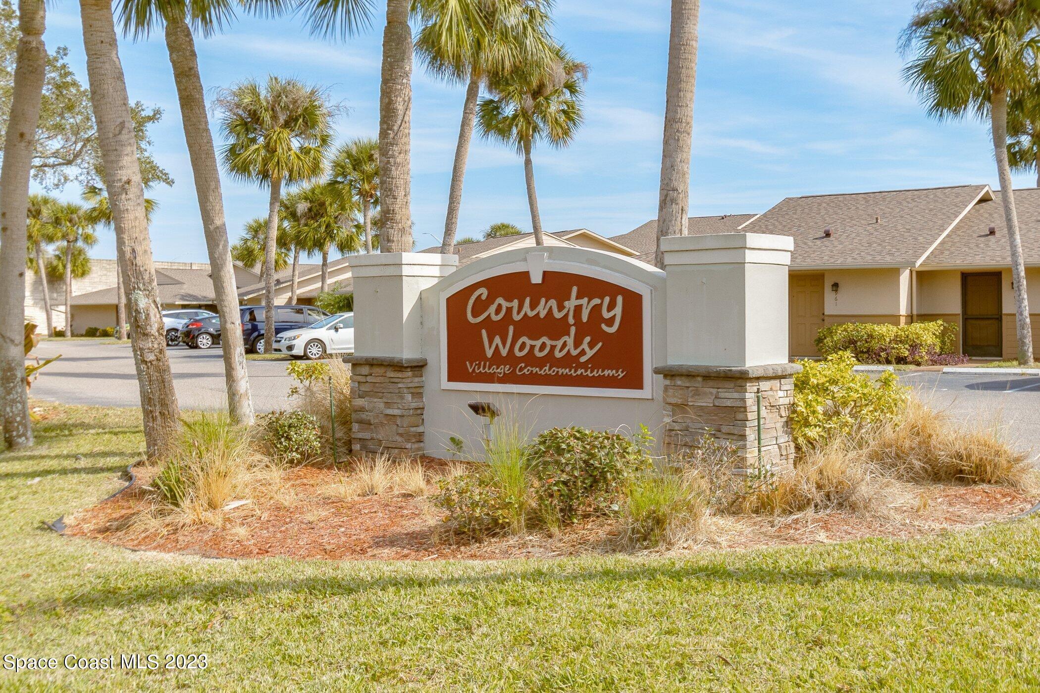 905 Prosperity Place, Unit 1902 Rockledge, FL 32955 - Photo 35 of 35 a sign on the side of the road