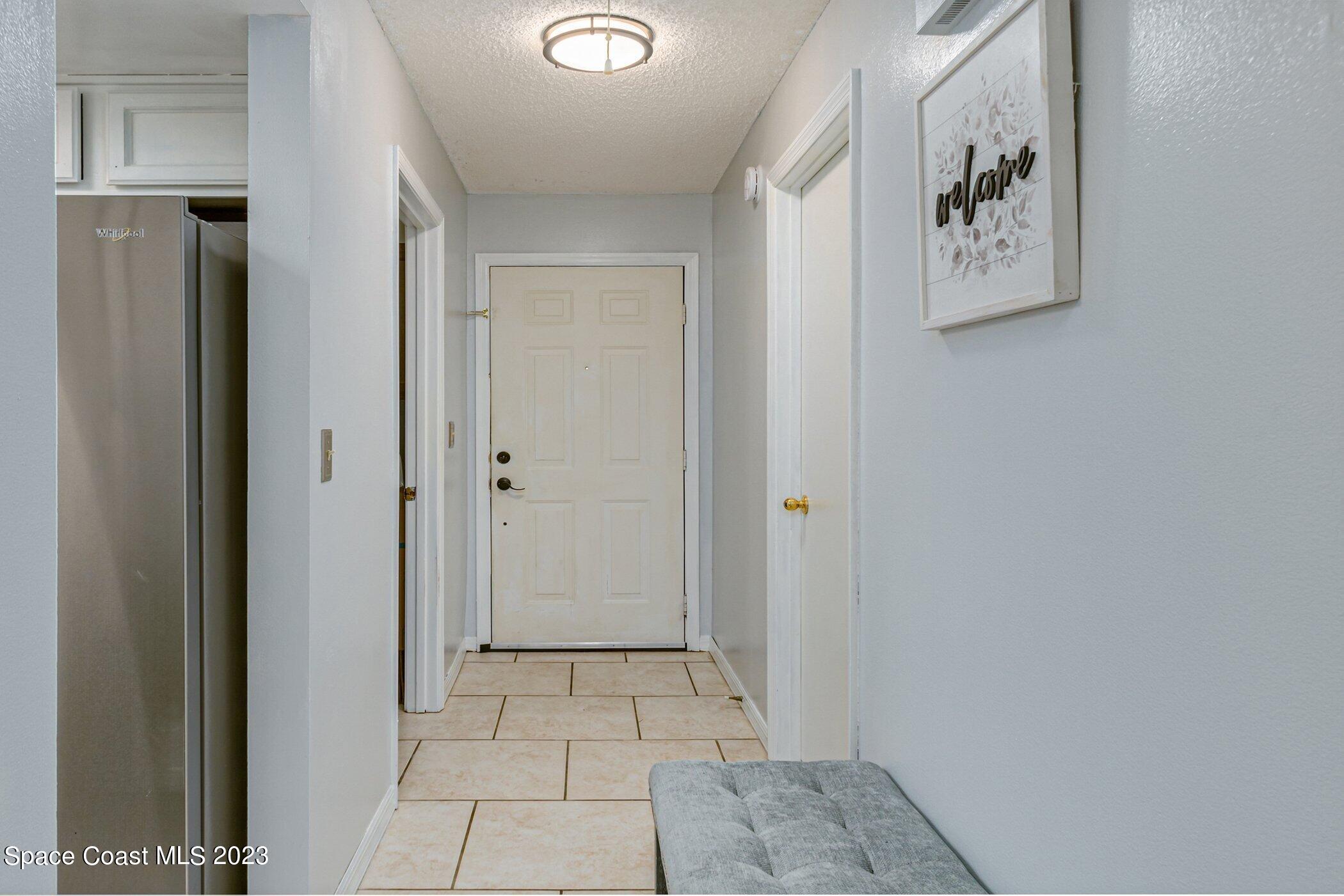 905 Prosperity Place, Unit 1902 Rockledge, FL 32955 - Photo 5 of 35 a view of a hallway