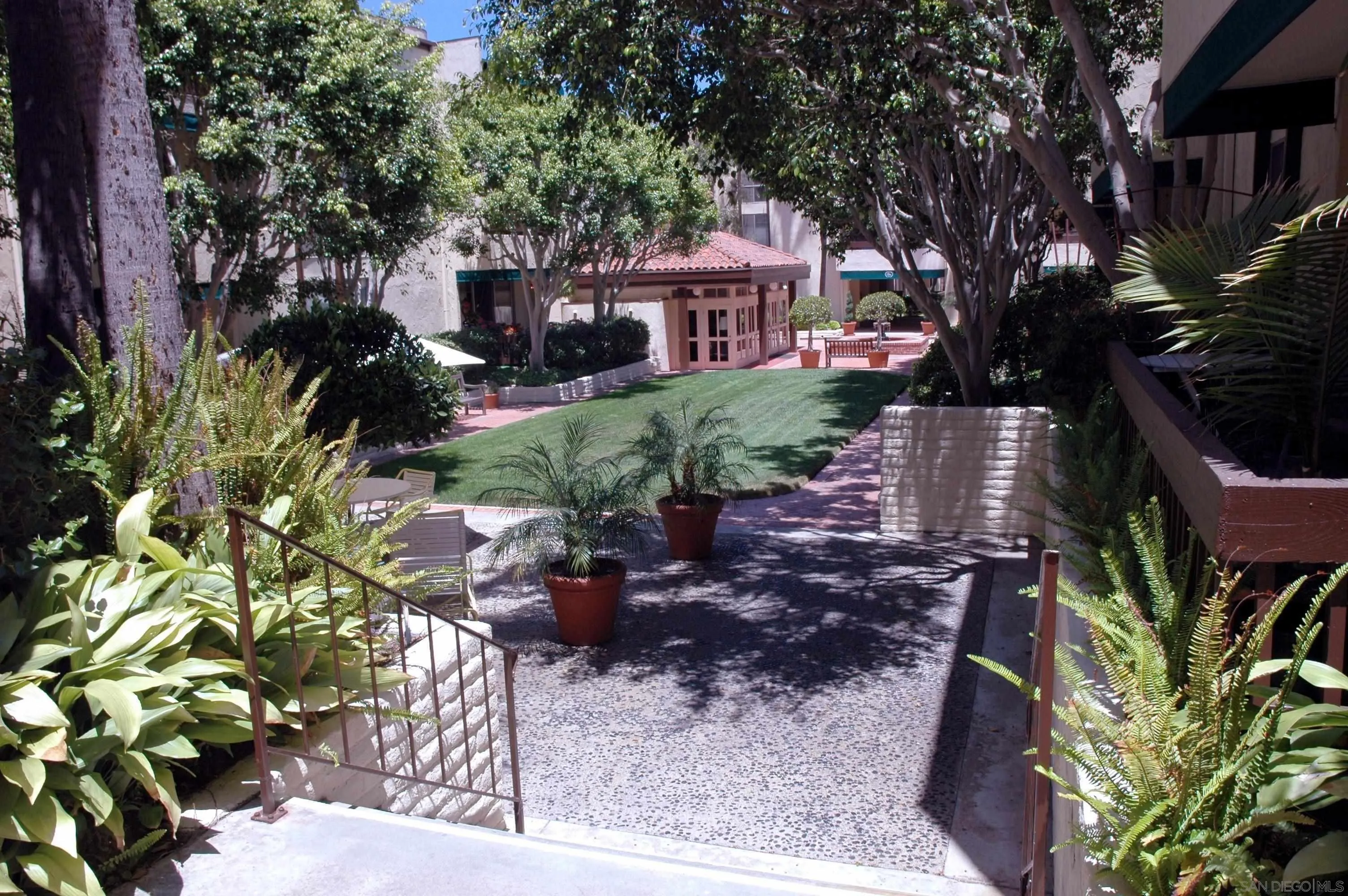 6455 La Jolla Boulevard, Unit 308 La Jolla, CA 92037 - Photo 16 of 18 a front view of a house with a yard