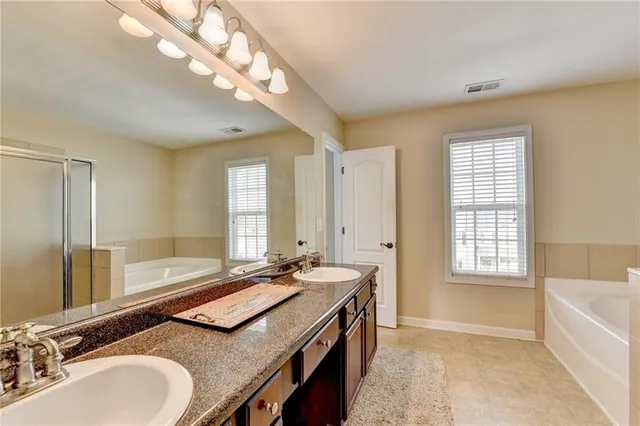 a view of balcony with wooden floor and seating space