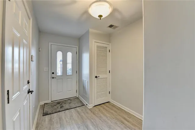 a bedroom with a bed and a table