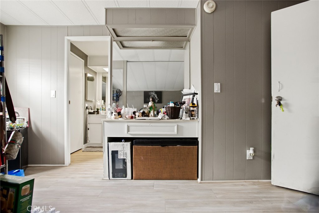 1414 West Central Avenue, Unit 10 Brea, CA 92821 - Photo 14 of 28 a view of living room with cabinets and wooden floor