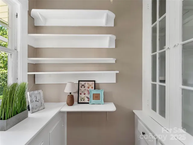 a view of a room that has a window