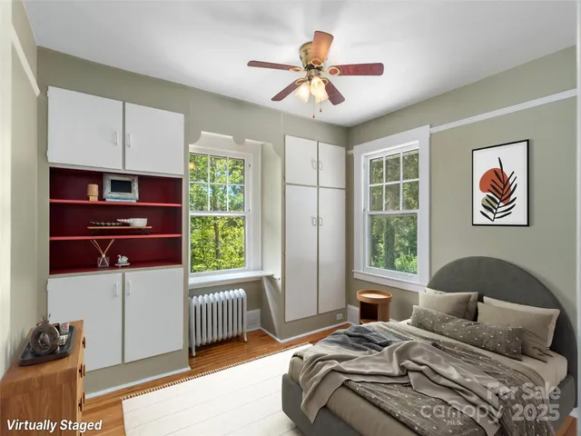 a view of a backyard with sitting area furniture and garden