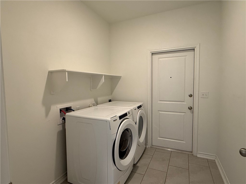 7730 Hulk Drive Corpus Christi, TX 78414 - Photo 21 of 22 a utility room with dryer and washer