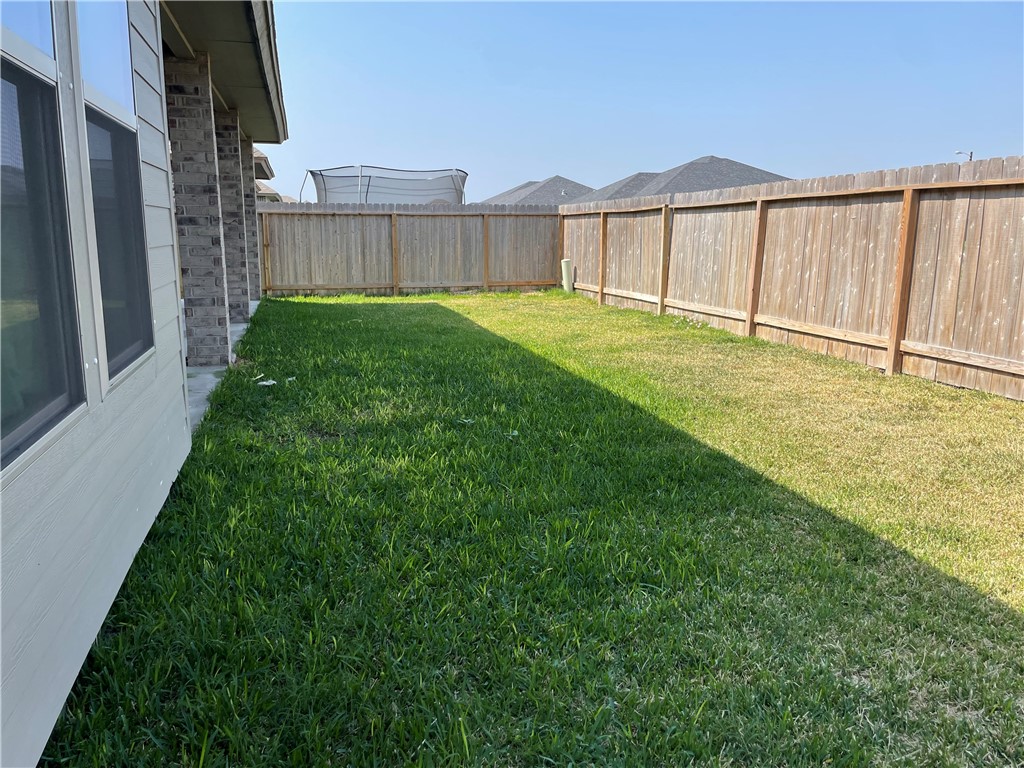 7730 Hulk Drive Corpus Christi, TX 78414 - Photo 22 of 22 a view of yard with a small yard and wooden fence