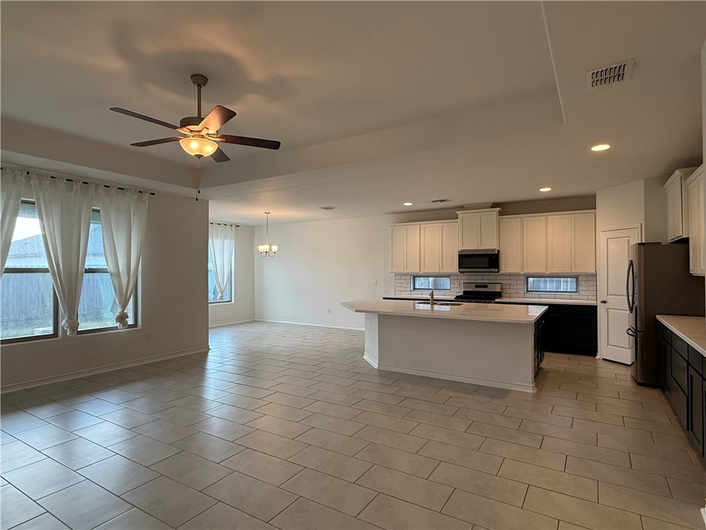 7730 Hulk Drive Corpus Christi, TX 78414 - Photo 5 of 22 a view of kitchen with refrigerator and window