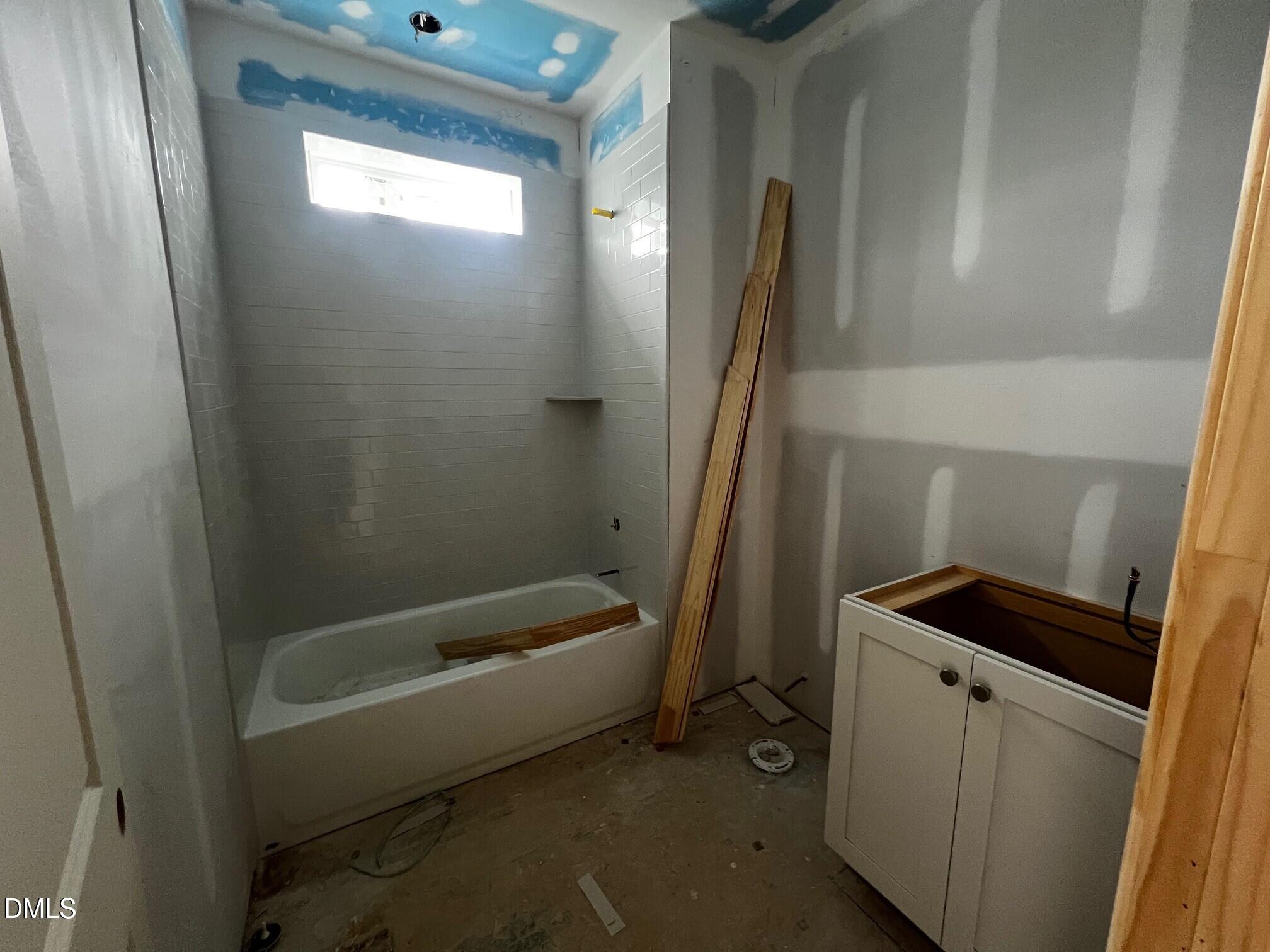 1675 Terry Road Durham, NC 27712 - Photo 10 of 23 a bathroom with a bathtub