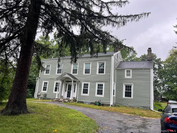 front view of house with a yard