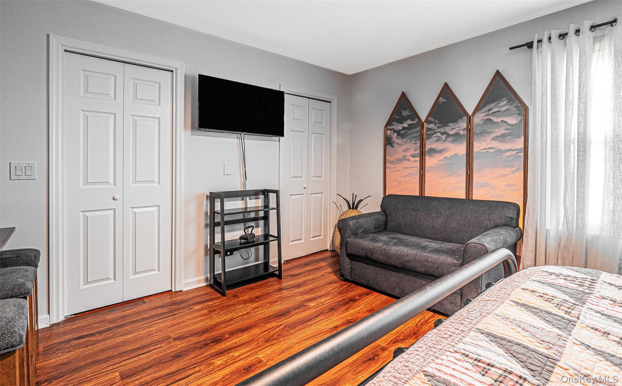 40 Weathervane Way Warwick, NY 10990 - Photo 23 of 29 a living room with furniture and a flat screen tv