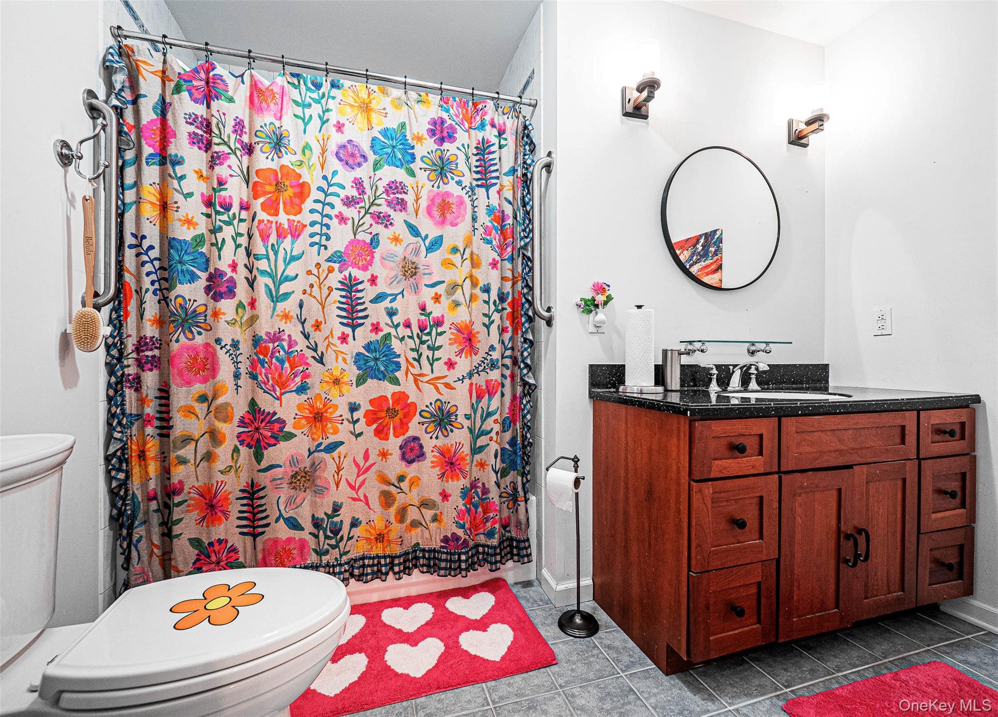 40 Weathervane Way Warwick, NY 10990 - Photo 24 of 29 a bathroom with a sink a mirror and a toilet