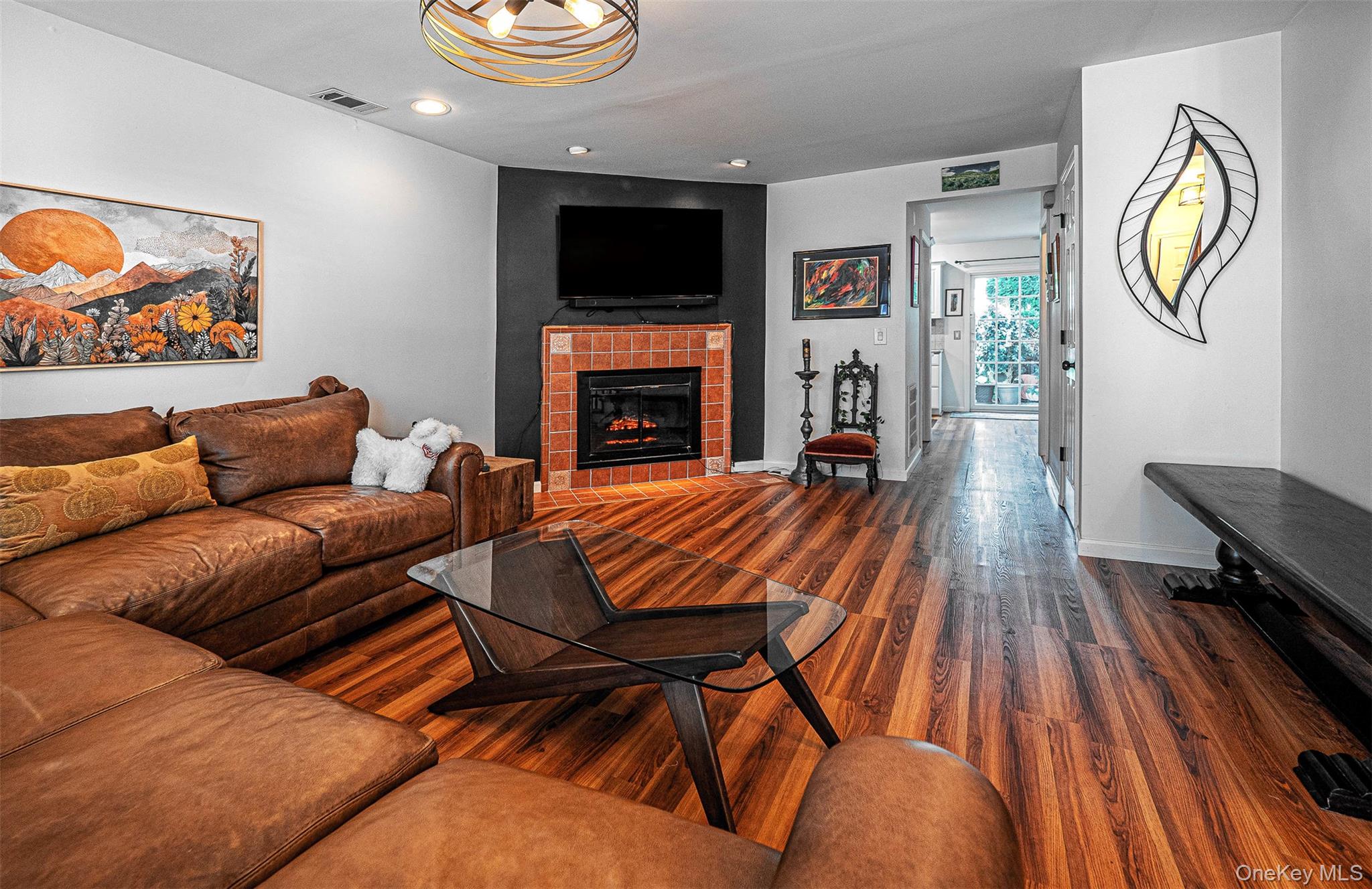 40 Weathervane Way Warwick, NY 10990 - Photo 6 of 29 a living room with furniture and a fireplace