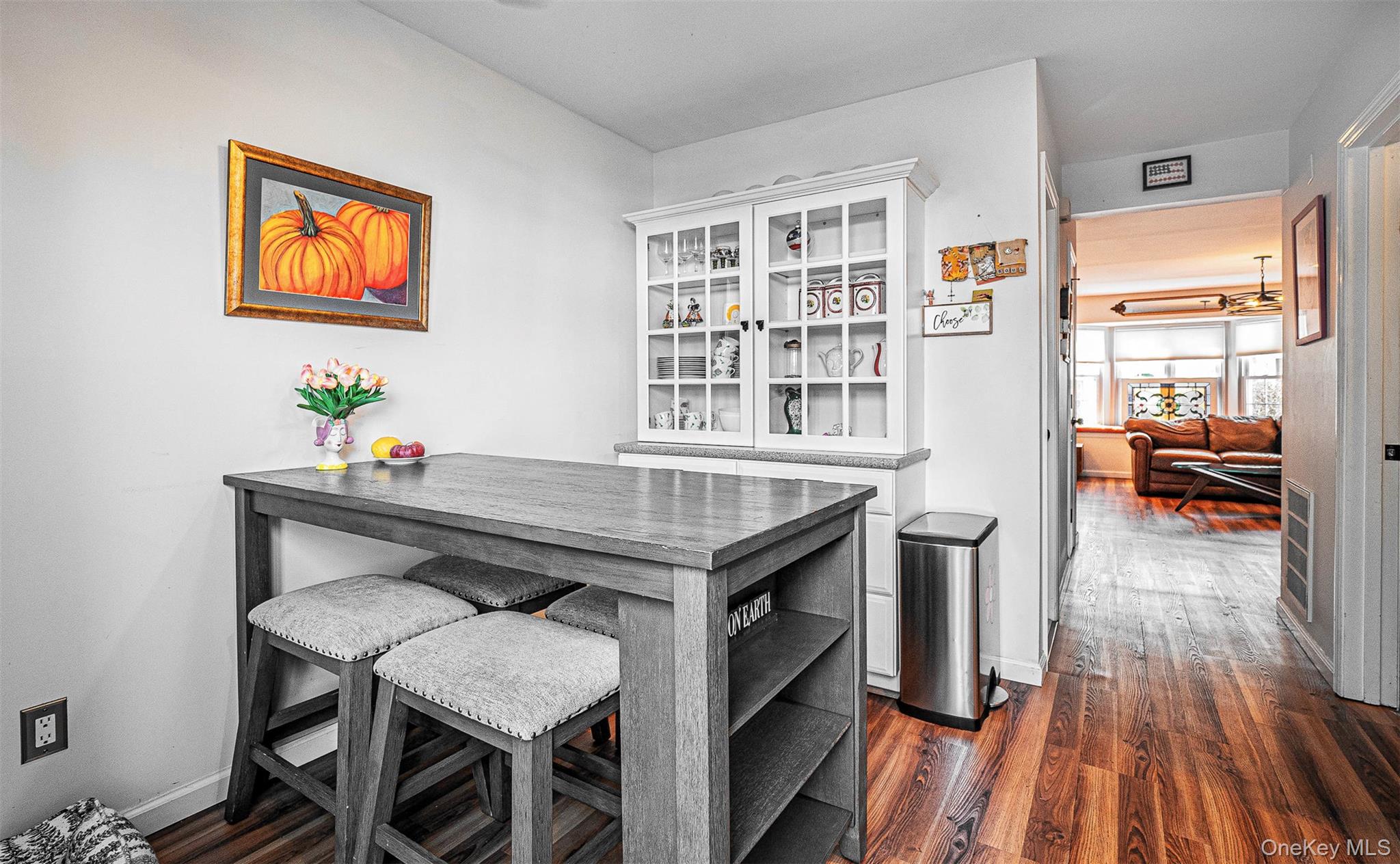 40 Weathervane Way Warwick, NY 10990 - Photo 10 of 29 a dining room with a wooden table and chairs