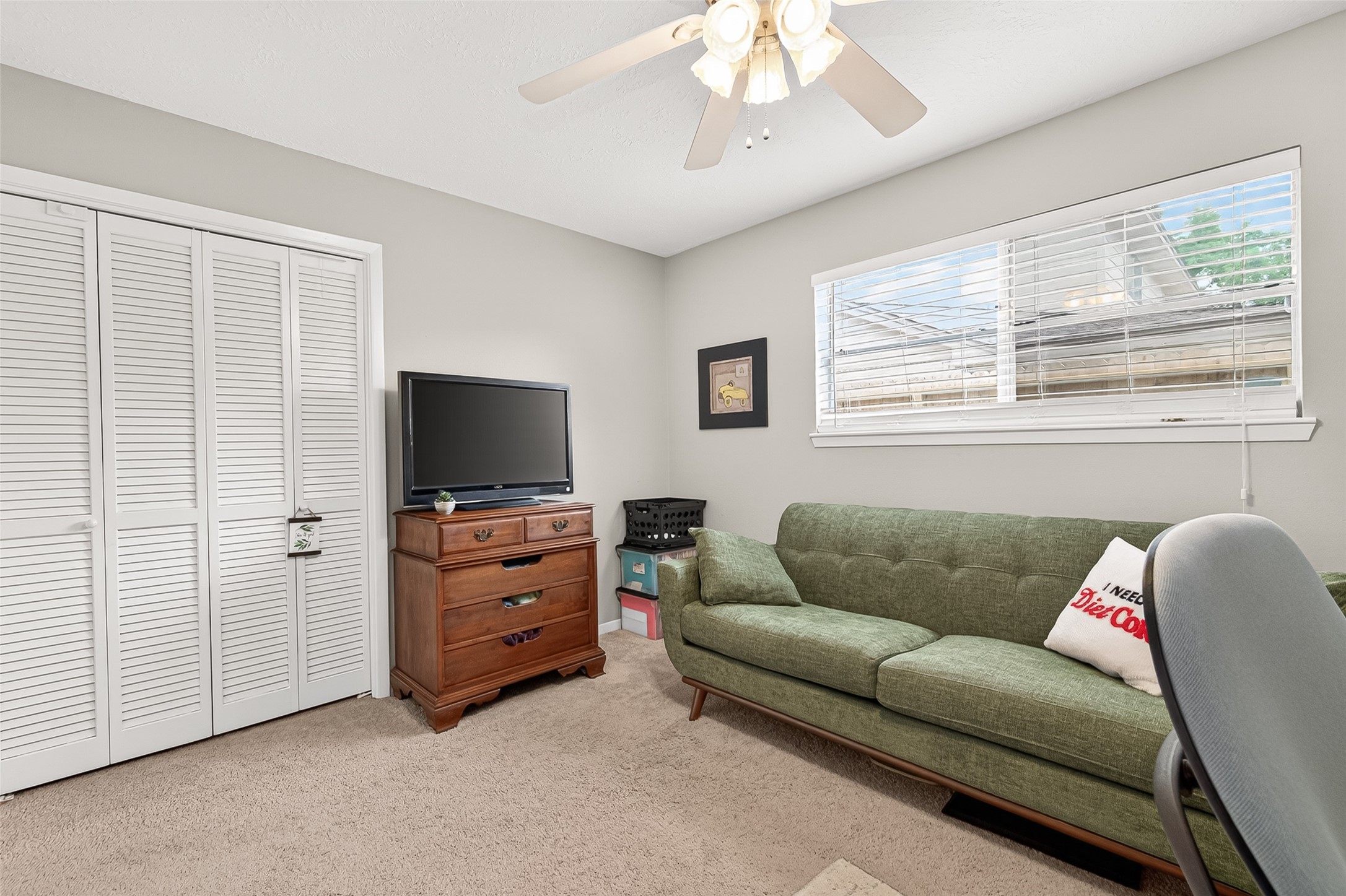 17611 Sorrell Ridge Drive Spring, TX 77388 - Photo 37 of 50 a living room with furniture and a flat screen tv