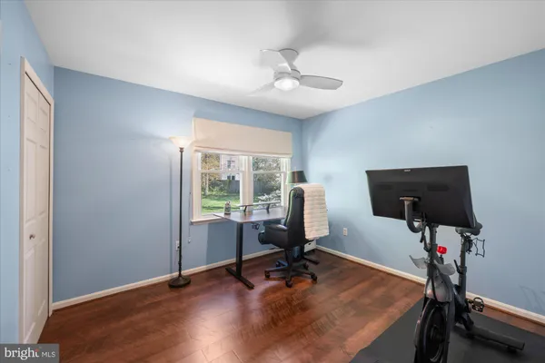 a workspace with furniture and a window