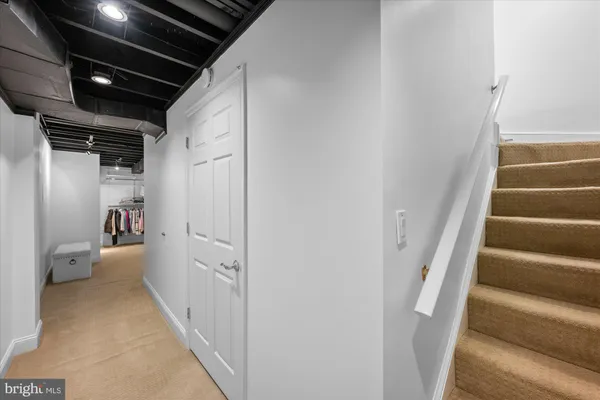a view of a room with lots of furniture