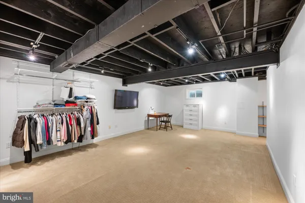 a hallway with cabinets