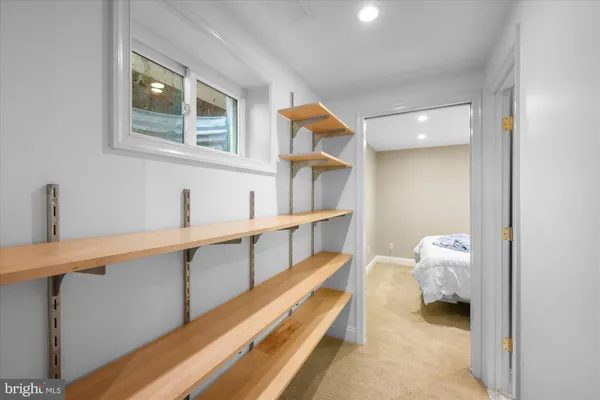 a large white bed in a white room