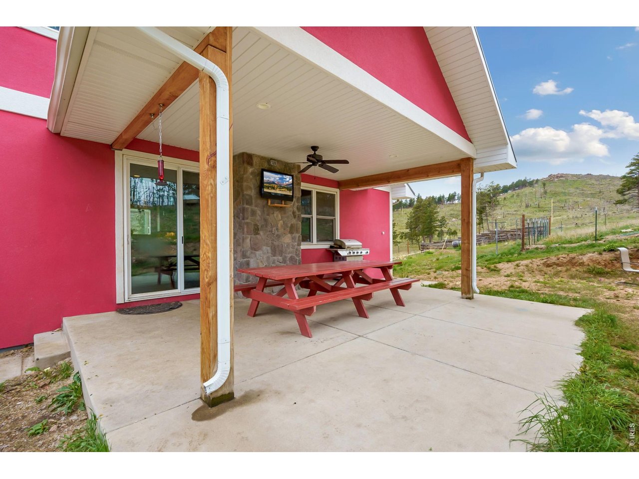 2051 Stove Prairie Road Bellvue, CO 80512 - Photo 42 of 50 covered back deck , great for gatherings!